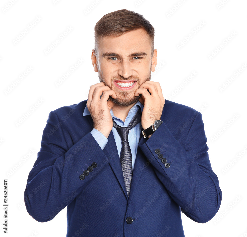 Young man scratching beard on white background. Annoying itch Young man scratching beard on white background. Annoying itch