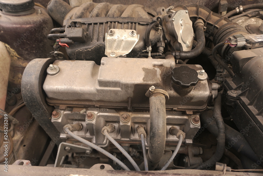 an old dirty car engine