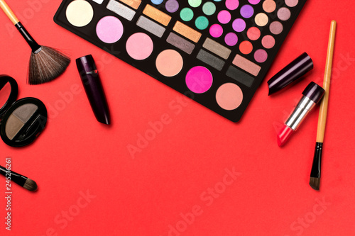 Set of cosmetics on color background.