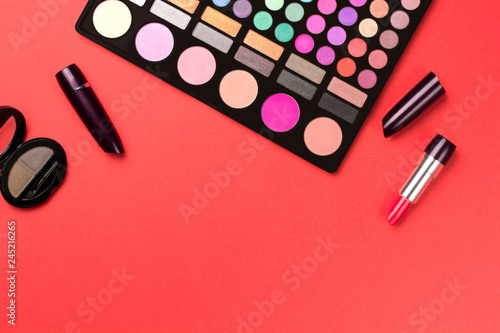 Set of cosmetics on color background.