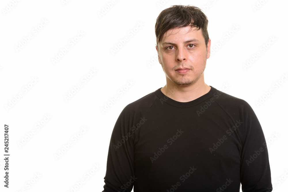 Studio shot of Caucasian man isolated against white background Studio shot of Caucasian man isolated against white background