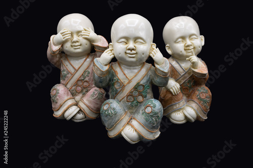 The three wise Buddha are a maxim, embodying the proverbial principle 