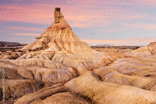 View of desert against cloudy sky photo