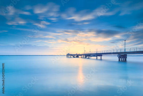 Wallpaper Mural Pier over sea against cloudy sky Torontodigital.ca