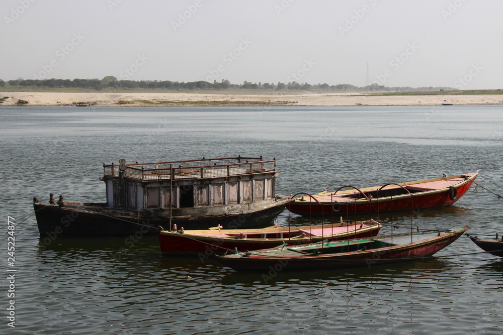 Moored old boats on Ganga river in Varanasi, India