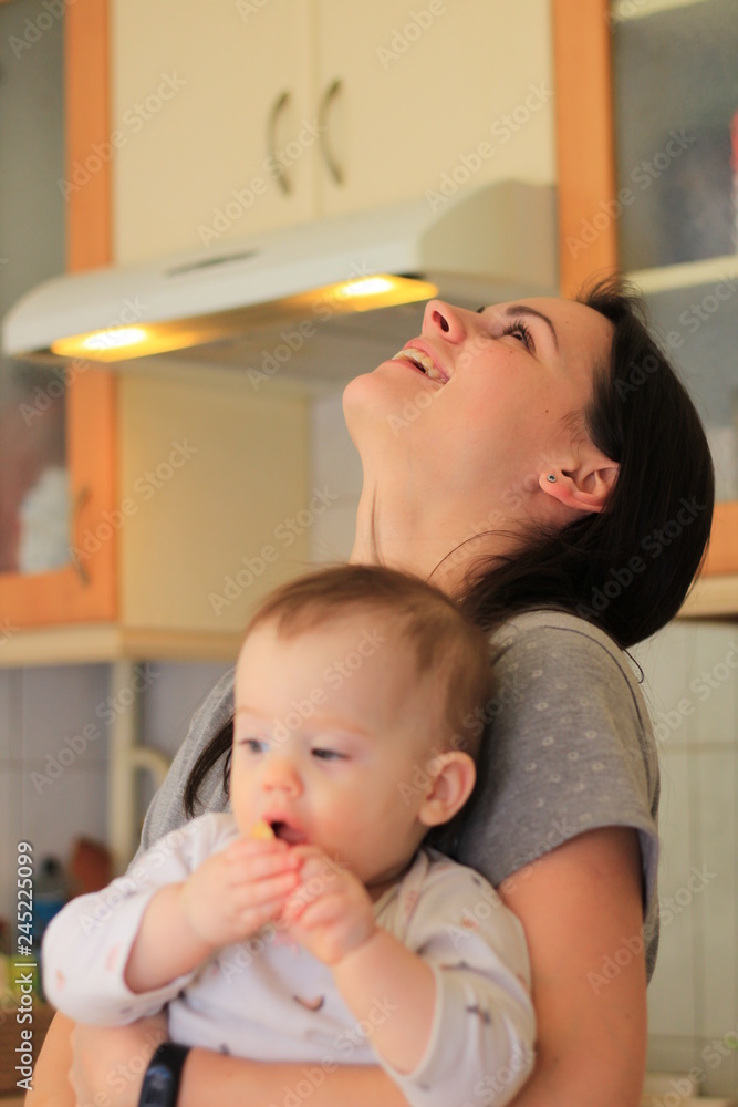 smiling beautiful mother with her baby smiling beautiful mother with her baby