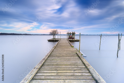 Wallpaper Mural View of wooden pier in Soustons Lake against cloudy sky Torontodigital.ca