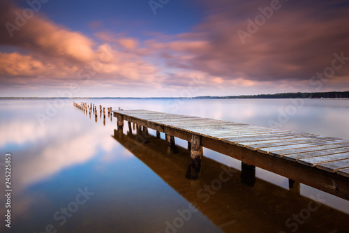 Wallpaper Mural View of pier in lake against cloudy sky Torontodigital.ca