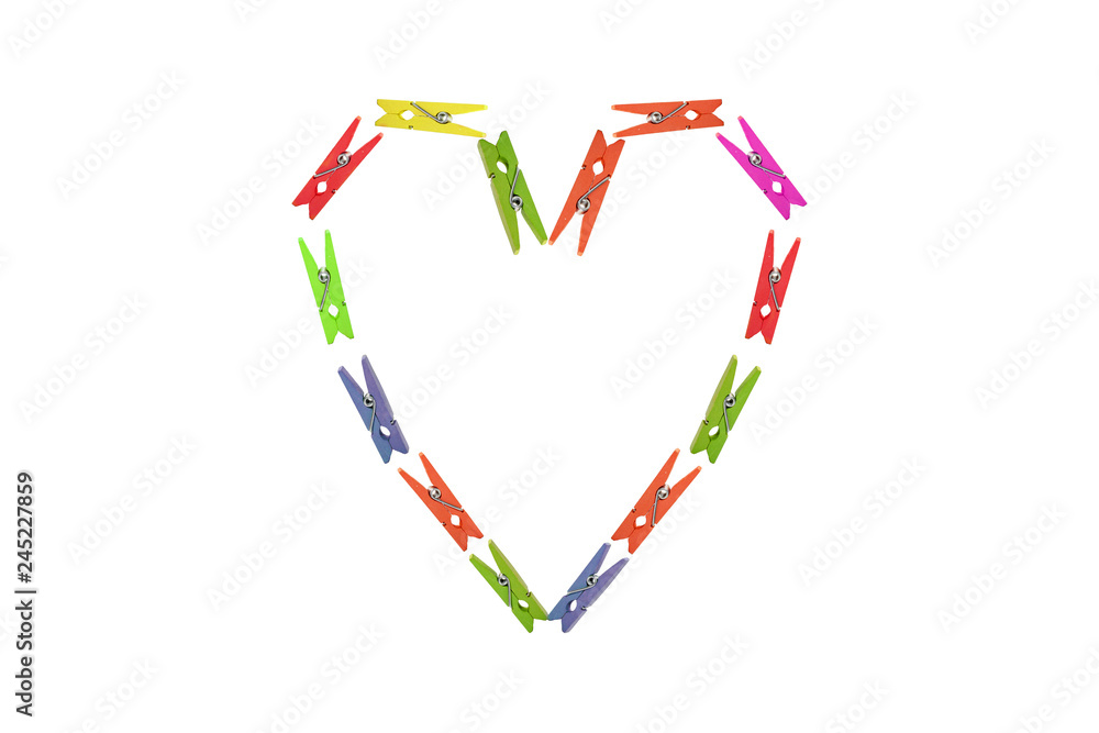 Fototapeta premium Heart form of clothespins on white background.