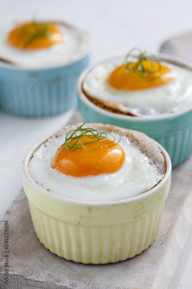 Shirred eggs for breakfast. Selective focus copy space Shirred eggs for breakfast. Selective focus copy space