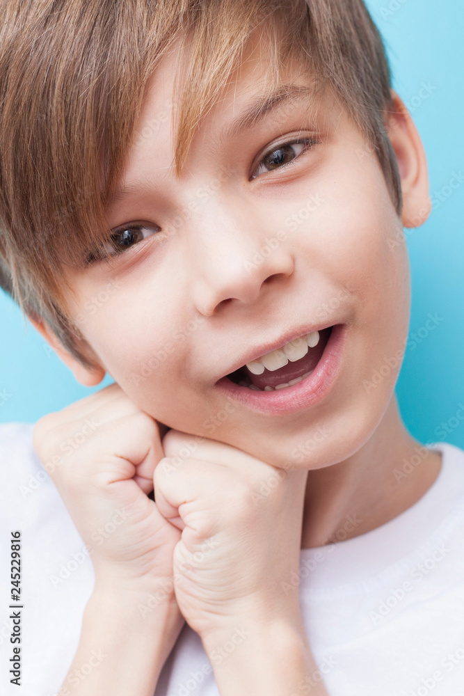 Boy smiles and is touched Boy smiles and is touched