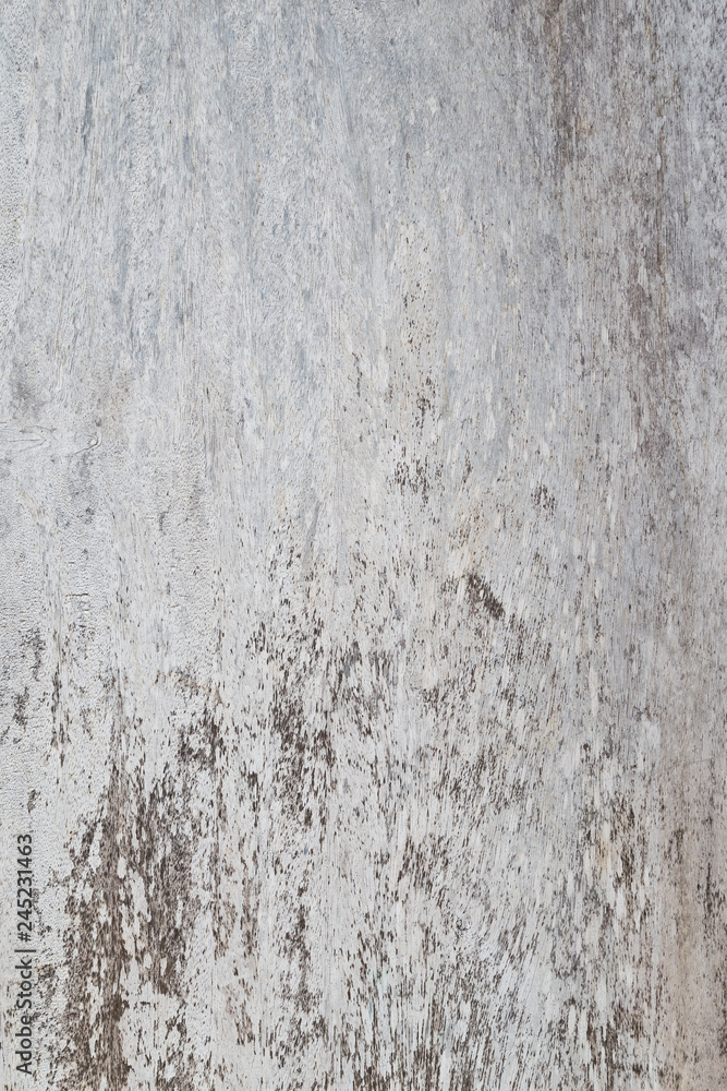 High resolution full frame background of a weathered, faded and dirty gray plywood or hardwood texture.