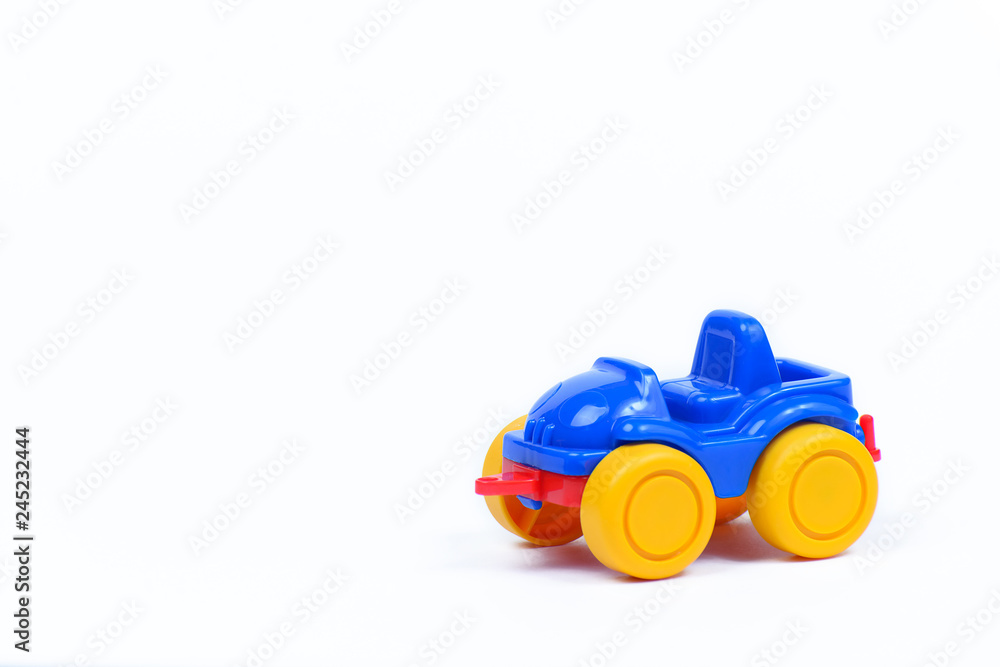 Toy plastic car on a white background Toy plastic car on a white background