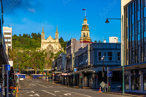 New Zealand, South Island. Dunedin - Stuart Street. There are St. Paul's Cathedral and Dunedin Town Hall in the background photo