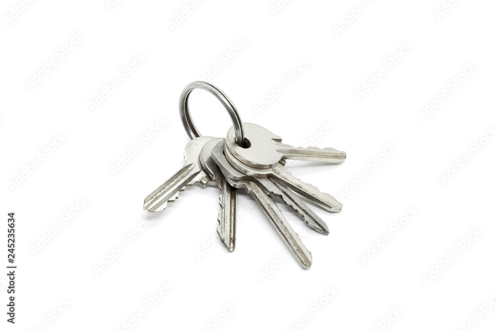 Silver keys on the ring on white background Silver keys on the ring on white background