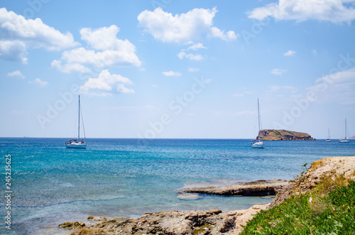 greek coastal landscape with boats