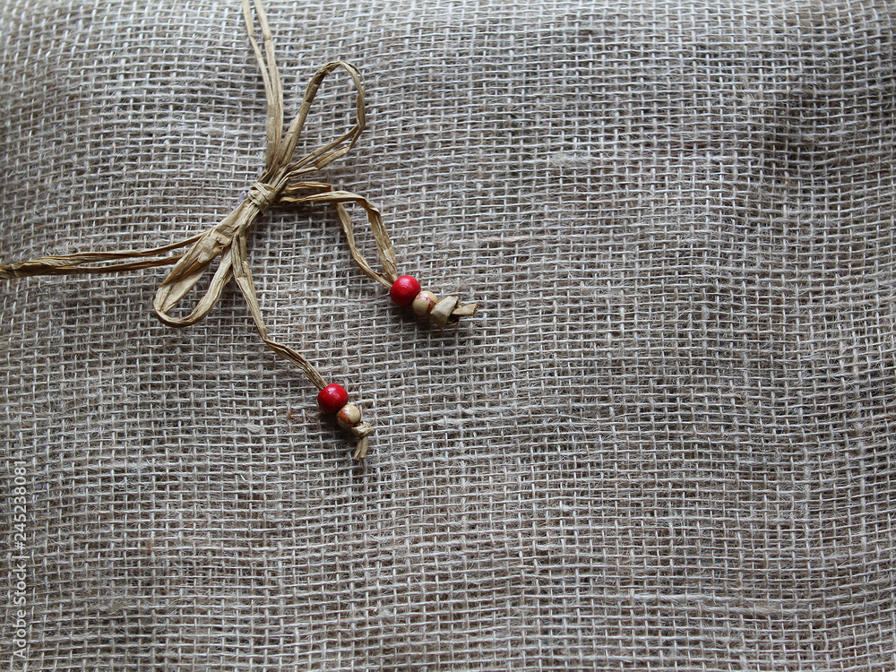 Wooden beads on gray canvas Wooden beads on gray canvas