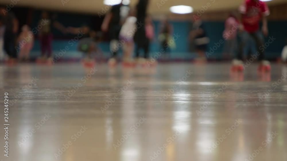 people at skating rink people at skating rink