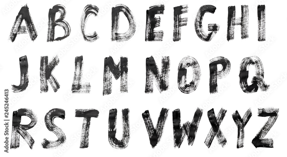 English alphabet written in black paint on a white isolated background. English alphabet written in black paint on a white isolated background.