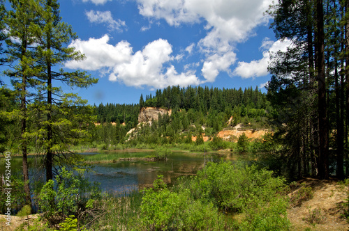 Hydraulically mined Pond Landscape after 100 years of recovery, Brandy City Pond, Gold Country, California  photo