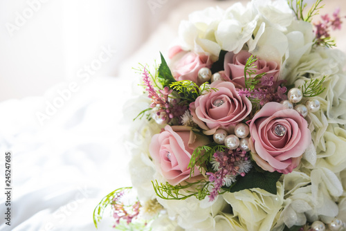 Bridal flowers bouquet with roses and ribbon