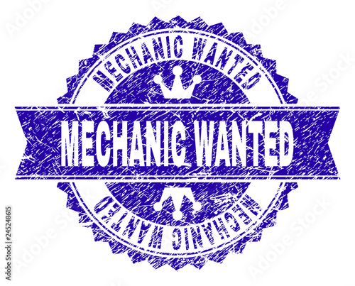 MECHANIC WANTED rosette stamp watermark with distress texture. Designed with round rosette, ribbon and small crowns. Blue vector rubber watermark of MECHANIC WANTED caption with dirty texture.