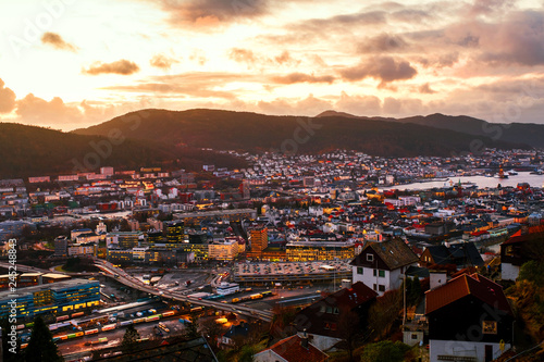Aerial view of Bergen, Norway at night. Colorful cloudy sunset sky
