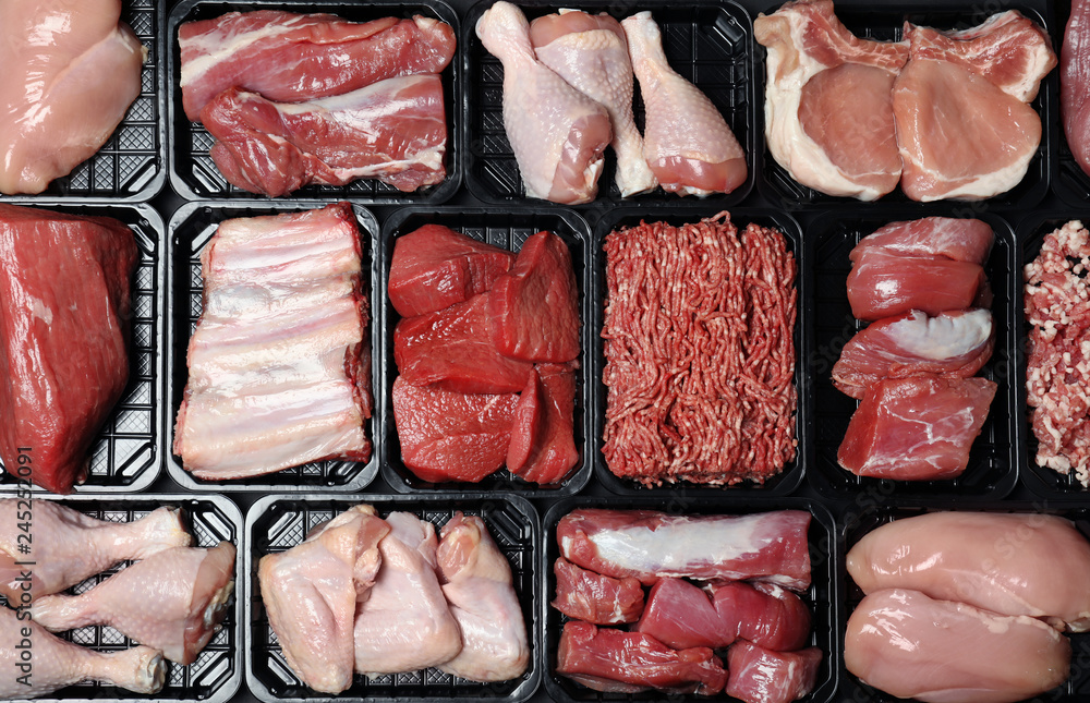 Containers with different raw meat, top view - obrazy, fototapety, plakaty 