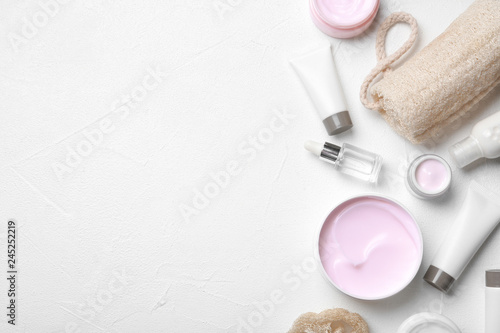 Flat lay composition with body care products and space for text on white background