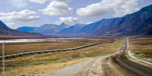 Dalton Highway (Haul Road) and Alaska Pipeline in the Brooks Range, Alaska photo