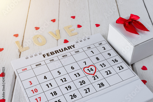 Calendar page with a red hand written heart highlight on February 14 of Saint Valentines day