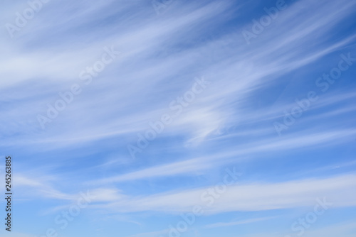 Cirrus clouds on blue sky, thin and wispy