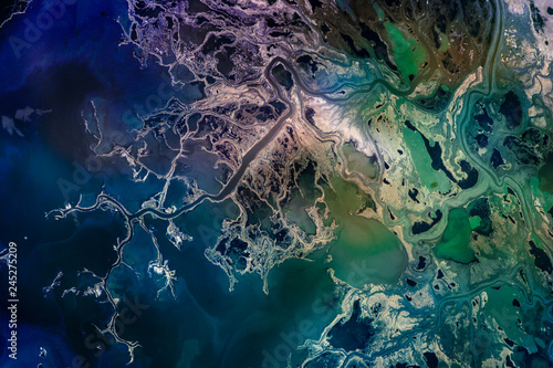 Saskatchewan River Delta, Manitoba, Canada. Satellite view. Colorful collage. Elements of this image are furnished by NASA.