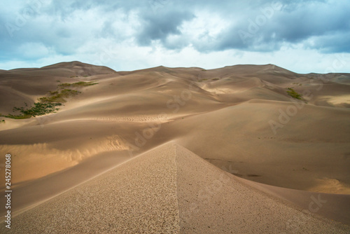 Sand Dunes with Dramatic Clouds 