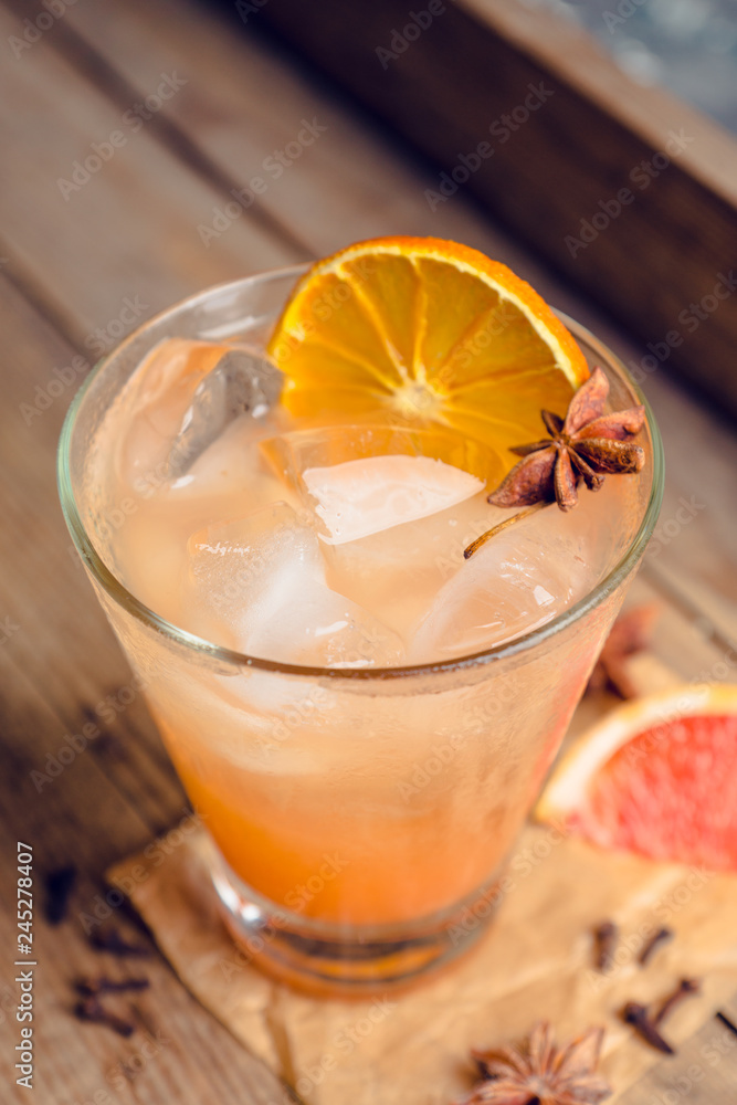 Fresh cocktail with grapefruits on the rustic background. Selective focus. Shallow depth of field. Fresh cocktail with grapefruits on the rustic background. Selective focus. Shallow depth of field.
