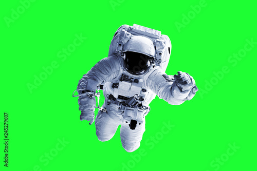 Fototapeta Naklejka Na Ścianę i Meble -  Green Screen Astronaut - Elements of this Image Furnished by nASA