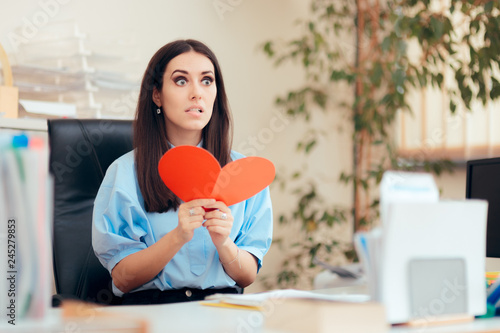 Office Woman Receiving Valentine Card from Secret Admirer photo