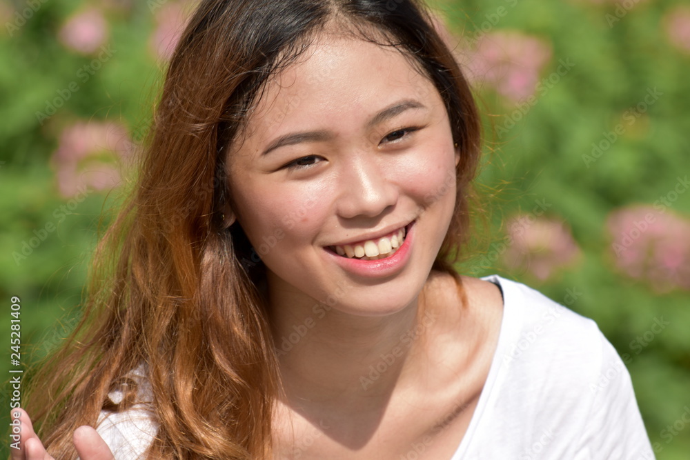 A Smiling Filipina Female A Smiling Filipina Female