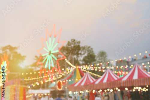 Blurred Background Image of Weekend Market Festival with Colorful Light Decorations