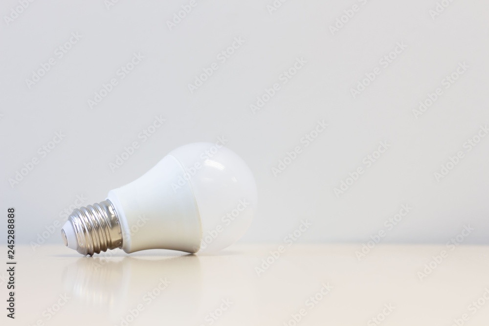 LED light bulb on table with white background LED light bulb on table with white background