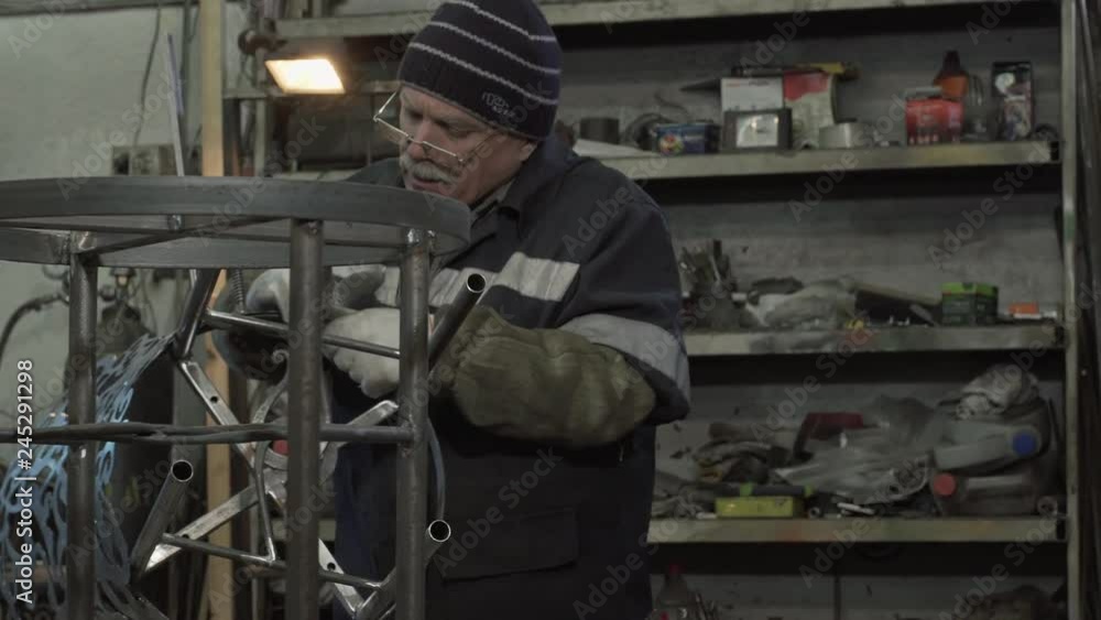 Male Blacksmith Is Working On His New Forged Products Male Blacksmith Is Working On His New Forged Products