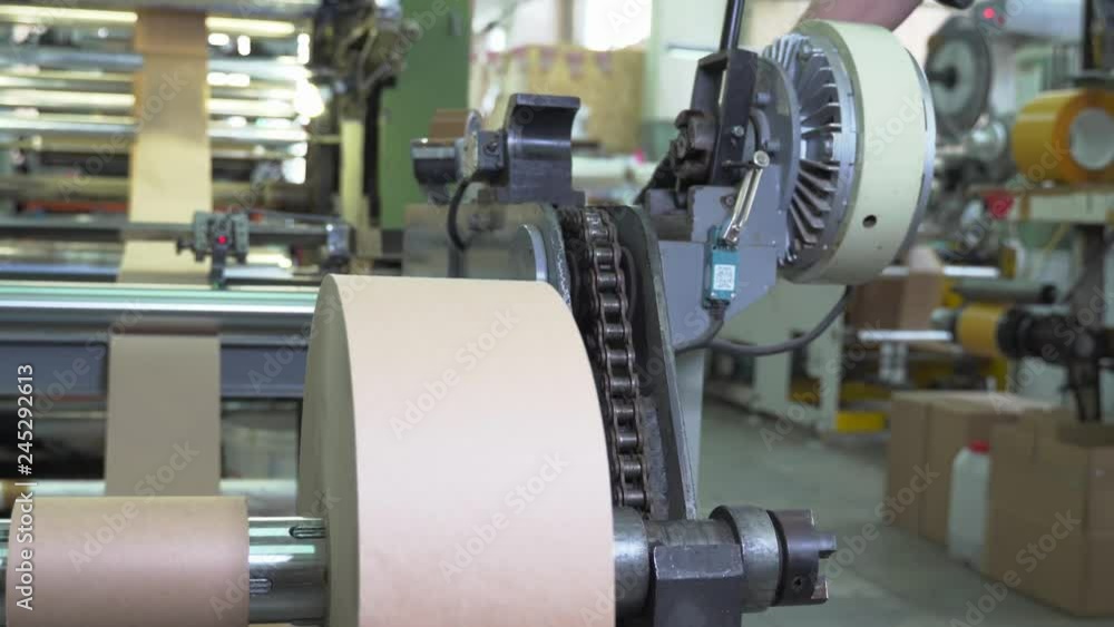 Paper (roll of paper) rotates on the printing press in the workshop.
Paper (roll of paper) rotates on the printing press in the workshop.