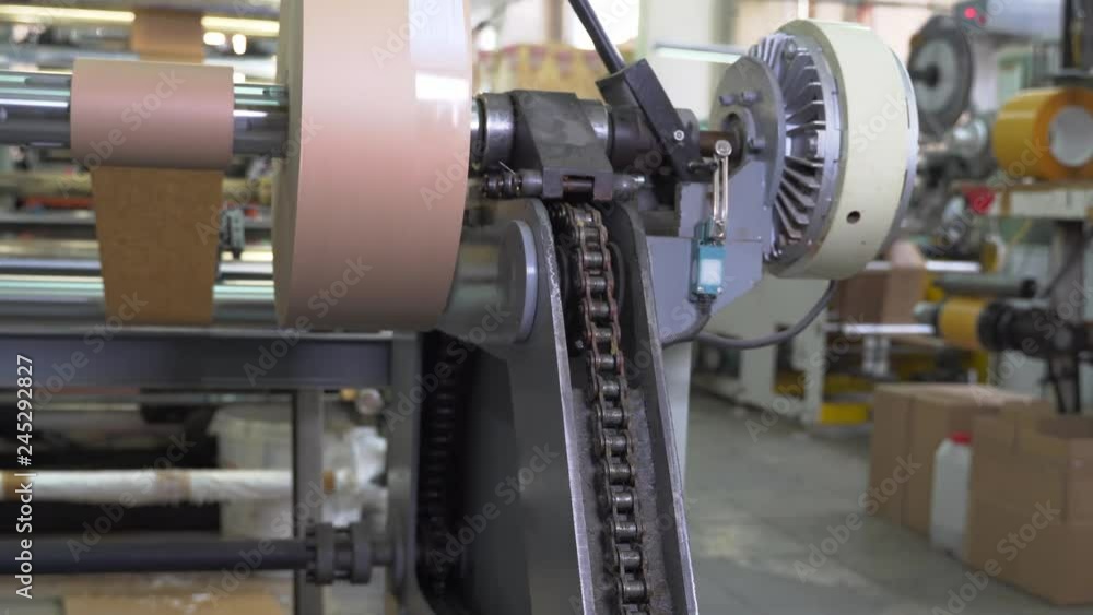 Paper (roll of paper) rotates on the printing press in the workshop.
Paper (roll of paper) rotates on the printing press in the workshop.