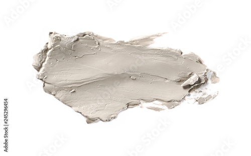 Cosmetic face cream, clay smeared and isolated on white background