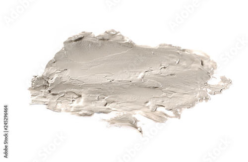 Cosmetic face cream, clay smeared and isolated on white background