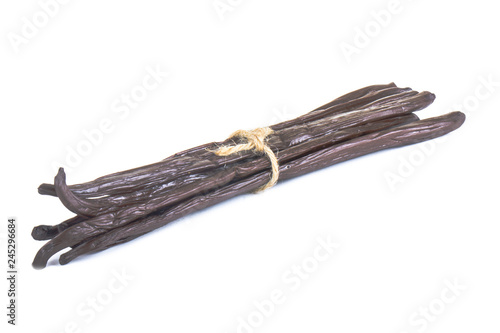 heap of vanilla pods isolated on white background