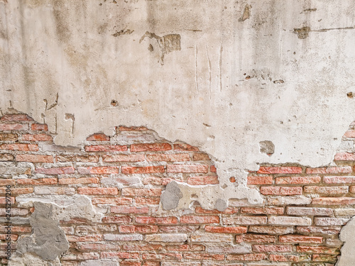 Картината върху платно Old brick wall in antiquity and was damaged