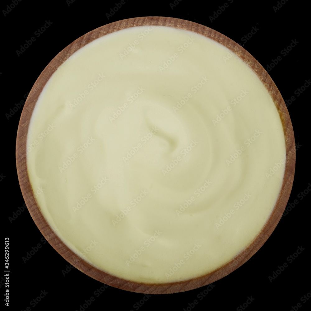 mayonnaise in wooden cup isolated on black background. top view mayonnaise in wooden cup isolated on black background. top view