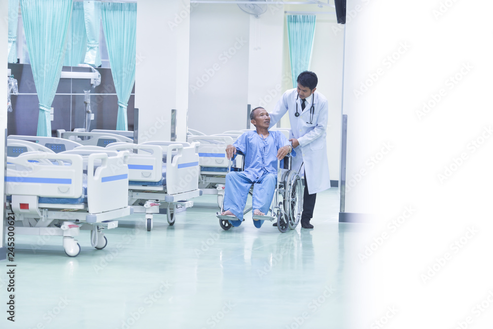 The patients in the hospital were happy holding the caregiver's hands while spending time together. The patients in the hospital were happy holding the caregiver's hands while spending time together.