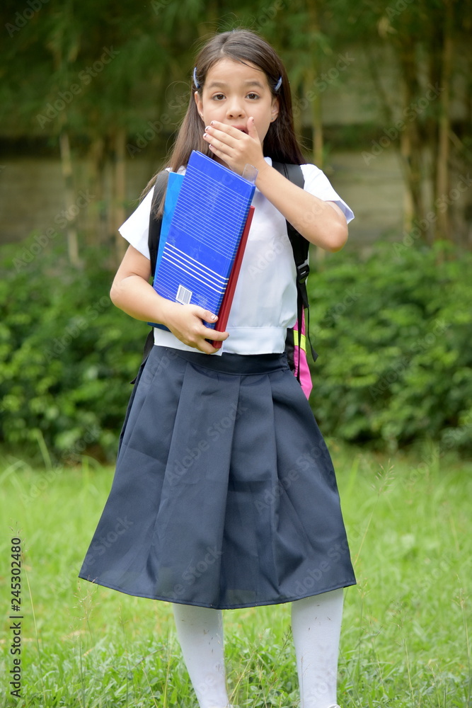 Startled Cute Girl Student Wearing School Uniform With Books Startled Cute Girl Student Wearing School Uniform With Books